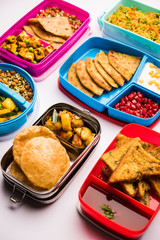 group of Lunch Box / Tiffin for Indian kids, showing variety or multiple option or combination of healthy food for your school going children