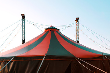 A fragment of the circus design, a dome on the sky background. A circus on wheels. Entertainment...
