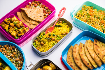 group of Lunch Box / Tiffin for Indian kids, showing variety or multiple option or combination of healthy food for your school going children