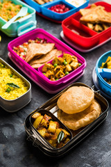group of Lunch Box / Tiffin for Indian kids, showing variety or multiple option or combination of healthy food for your school going children