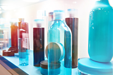 Showcase shop with plastic bottles shampoo