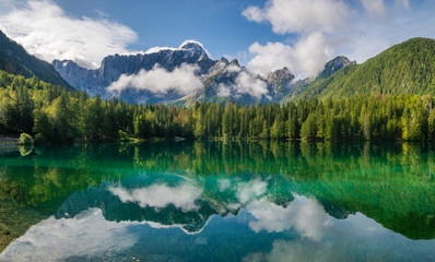 beautiful sunny morning on an alpine lake in the Julian Alps in Italy
