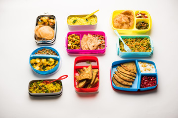 group of Lunch Box / Tiffin for Indian kids, showing variety or multiple option or combination of...
