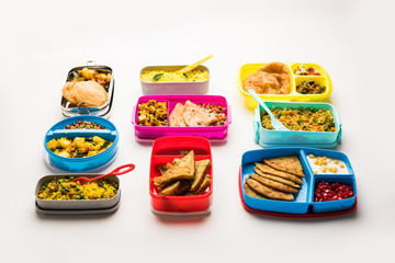 group of Lunch Box / Tiffin for Indian kids, showing variety or multiple option or combination of healthy food for your school going children