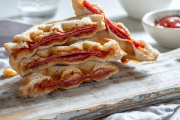 pizza waffle with ham, pepperoni and cheese