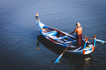 Old men rowing boat
