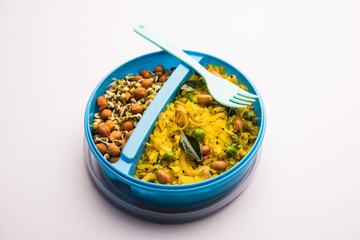 Lunch Box / Tiffin for Indian kids, hot Poha made using beaten rice and spices, accompanied with sprouts
