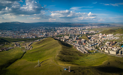 Aerial view of Ulaanbaatar in Mongolia during summer. A city in the hills
