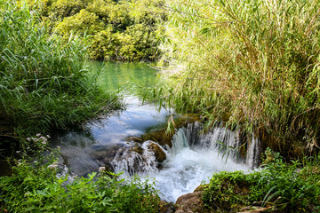 Obraz premium Beautiful river filled with waterfalls in Krka National Park Croatia