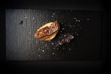 Spanish foie tapa with lilac sauce and bread © robcartorres