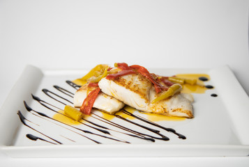 hake fish dish with peppers