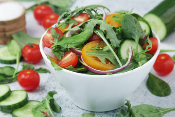 A bowl full of vegetable salad	