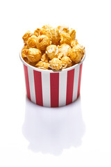 Popcorn in striped paper box on white background  isolated stock photo