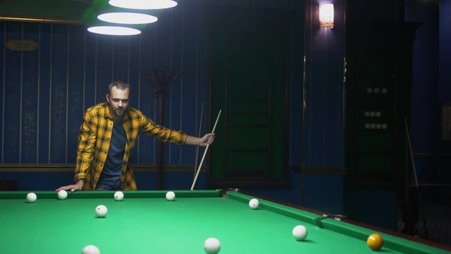 man plays billiards. the concept of billiards, hobbies, sports