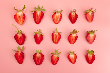 Strawberries on pink background. Fresh organic food concept