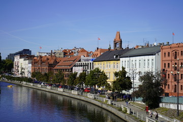 Fototapeta na wymiar Bydgoszcz, Poland - September 2019: View of the city water canal of the Brda River in the city center. City architecture.