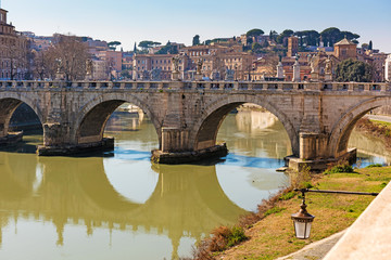 Naklejka premium Rome, Italy, February 20, 2017 - view of Rome, Italy. Tiber River with bridges in Rome. Beautiful scenic panorama of Rome city.