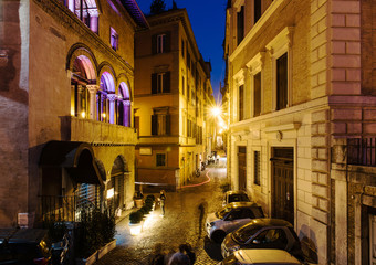 Fototapeta na wymiar Old street in Rome, Italy. View of old cozy street in Rome.