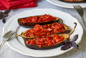 Stuffed eggplants with tomatoes and bell peppers  