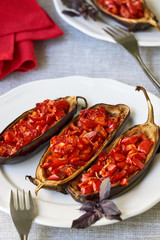 Stuffed eggplants with tomatoes and bell peppers  