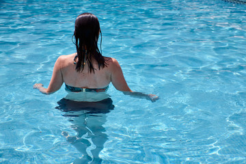 woman swimming in a pool