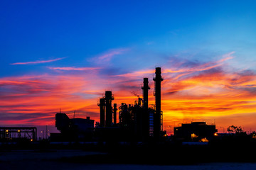 Black silhouette Petrochemical plant at sunset, Twilight and Night.