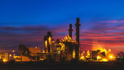 Fototapeta na wymiar Petrochemical plant at sunset, Twilight and Night.