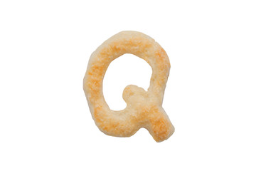 Letter "Q" made from sweet puffs. Edible English alphabet. The letters of the English alphabet from baking