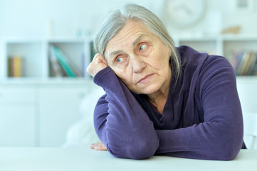 Portrait of young woman working sleeping in office