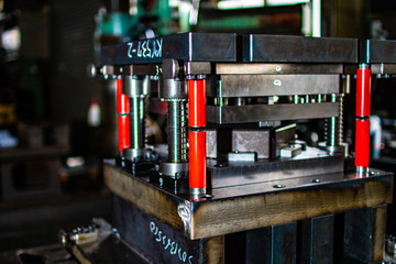 Sheet Metal Stamping Tool Die for Automotive Precision Parts on The Numerical Control Milling Machine Table. Tandem Stamping System. At a High Quality Technology Factory.