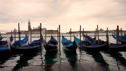 4k video of Gondola boat in Venice, Italy. Venetian famous touristic symbol