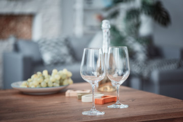 Two wine glasses, grape and wine bottle