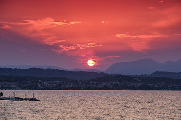 Sunrise over a lake in the Alps