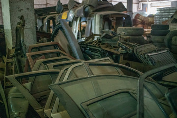 Used spare parts, disassembly. Old car parts suitable for future use. Different old spare parts from cars. Sale of old spare parts from the car