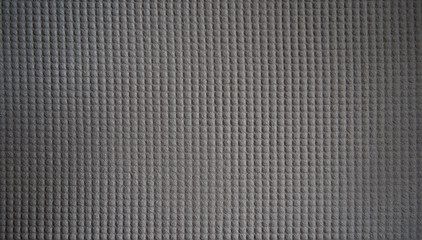 Fototapeta na wymiar Texture from gypsum plaster with squares.