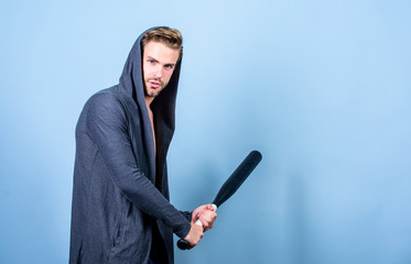 sport activity. full of energy. Sport. Hooligan man hits the bat. aggression and anger. Bandit gang...
