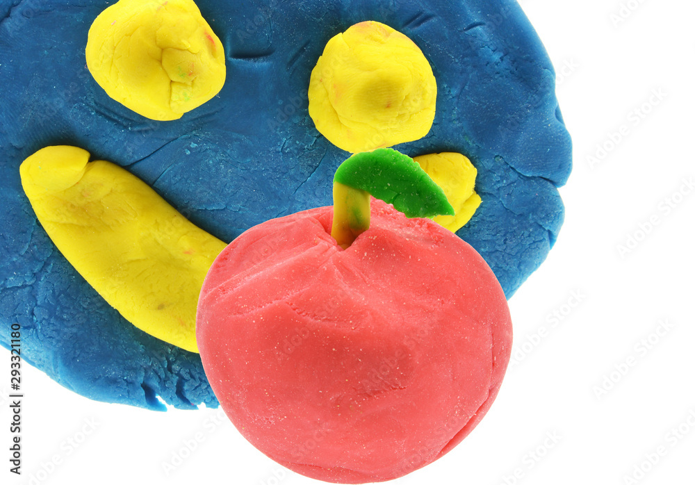 Wall mural colorful dough toy isolated on white background