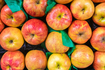 Organic apples background on market