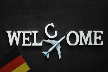 Background concept. Inscription Welcome on a dark background.