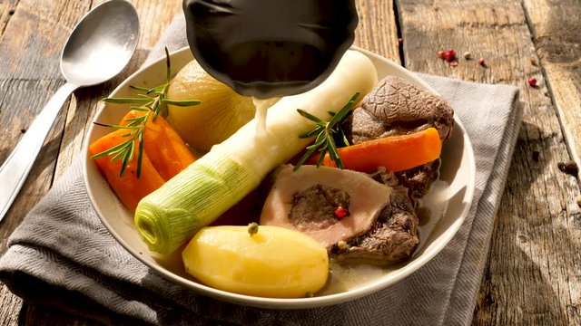pot au feu, beef stew with broth and vegetable