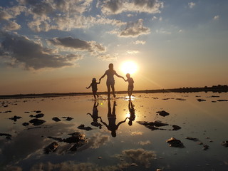 silhouette of woman at sunset