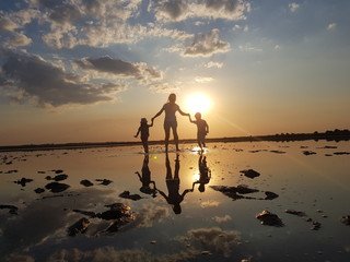 silhouette of young woman at sunset