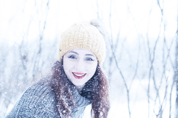 Beautiful girl in a beautiful winter snow