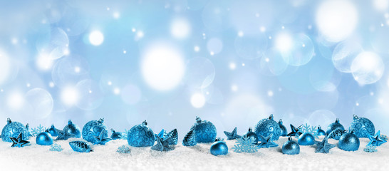 Christmas border with blue ornaments