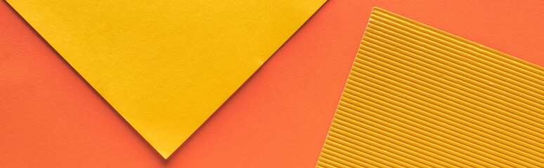 Fototapeta premium top view of yellow and orange background with copy space, panoramic shot