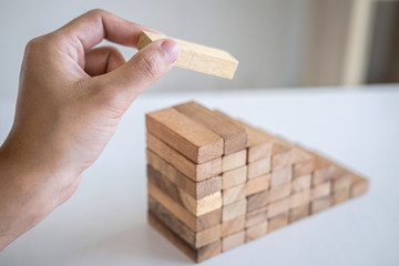 Alternative Risk and Strategy in business to make growth, Image of Business man's hand placing...