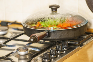 Chopped vegetables on frying pan