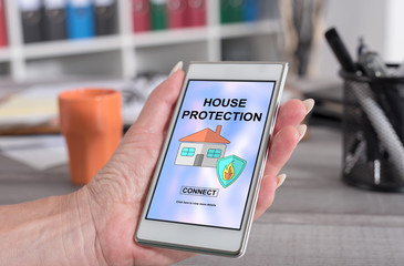 House protection concept on a smartphone