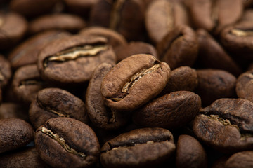 Coffee beans close-up background. Fresh roasted