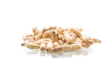 ripe organic peanuts in shell isolated on a white